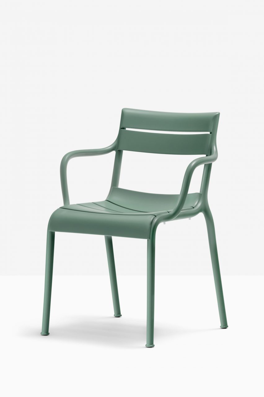Souvenir armchair in green, front quarter view on white backdrop