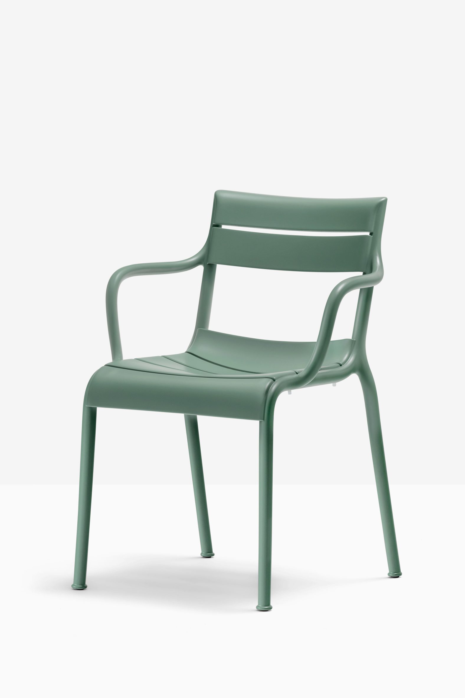 Souvenir armchair in green, front view on white background
