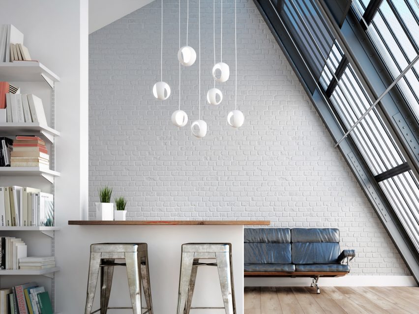 A photograph of Hydrogen one of Two Part's white pendant lights