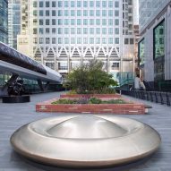 Peter Newman adds UFO public bench to Canary Wharf to "encourage contemplation of the sky"