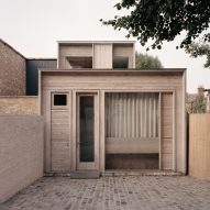Timber structure and finishes define London home by Russell Jones