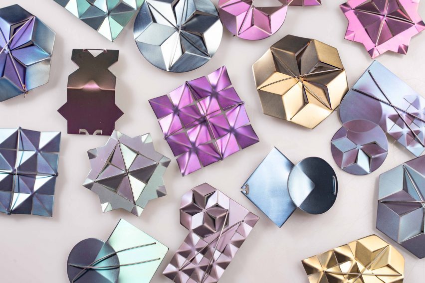 Aerial shot of metallic geometric brooches
