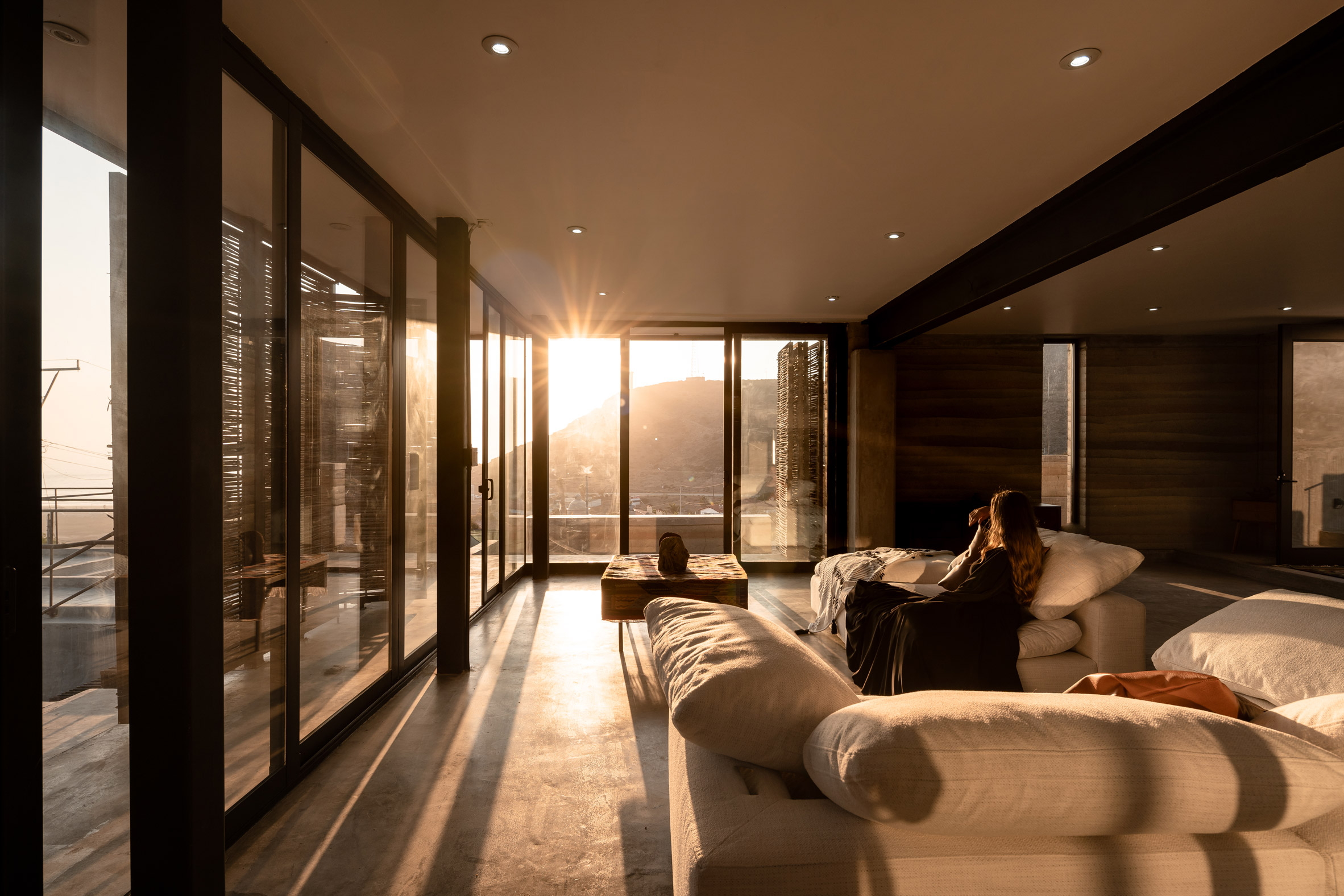 Light-filled open-plan living space by Alfredo Navarro Tiznado