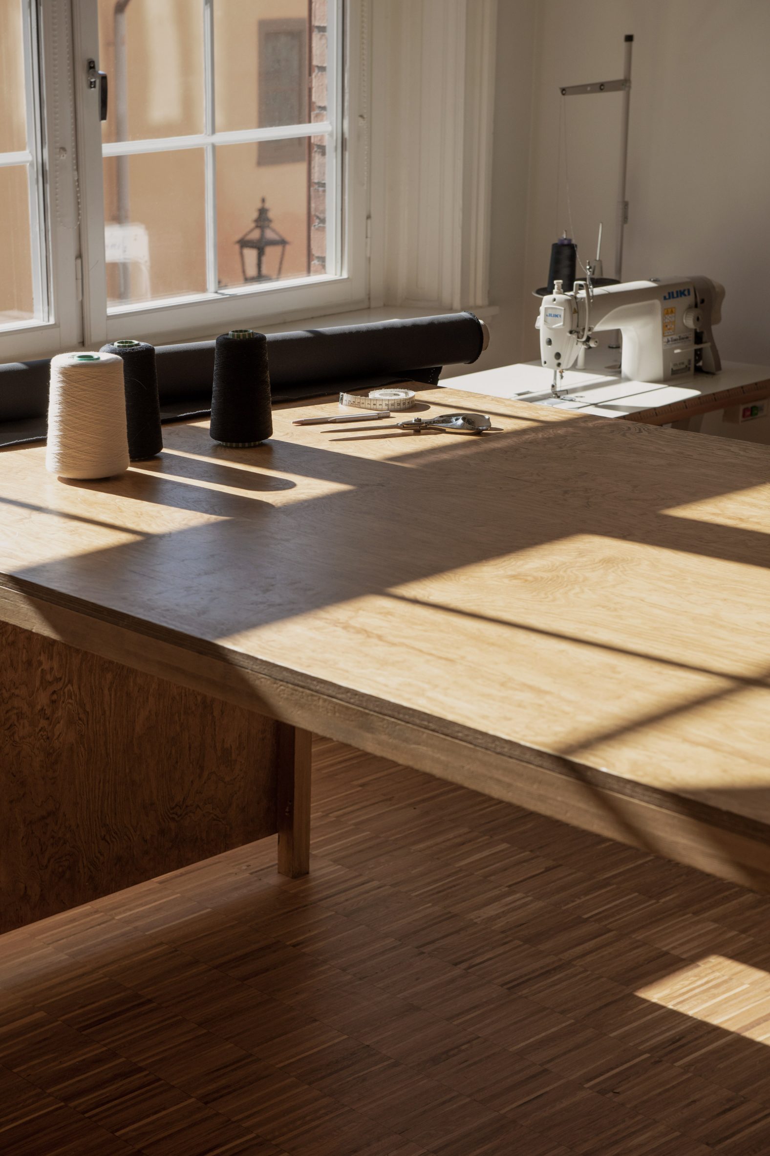 A wooden meeting table in an office