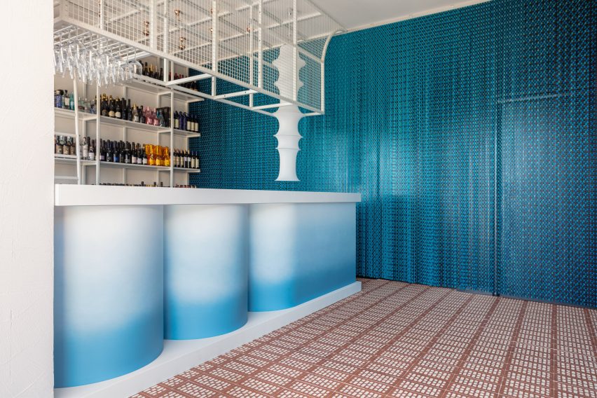 Blue bar interior with curtain inspired by ocean