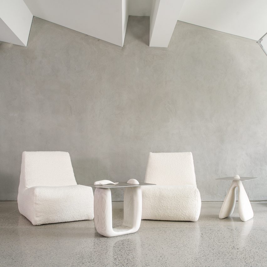 Two Coralis tables by Nadine Hajjar Studio next to two white seats