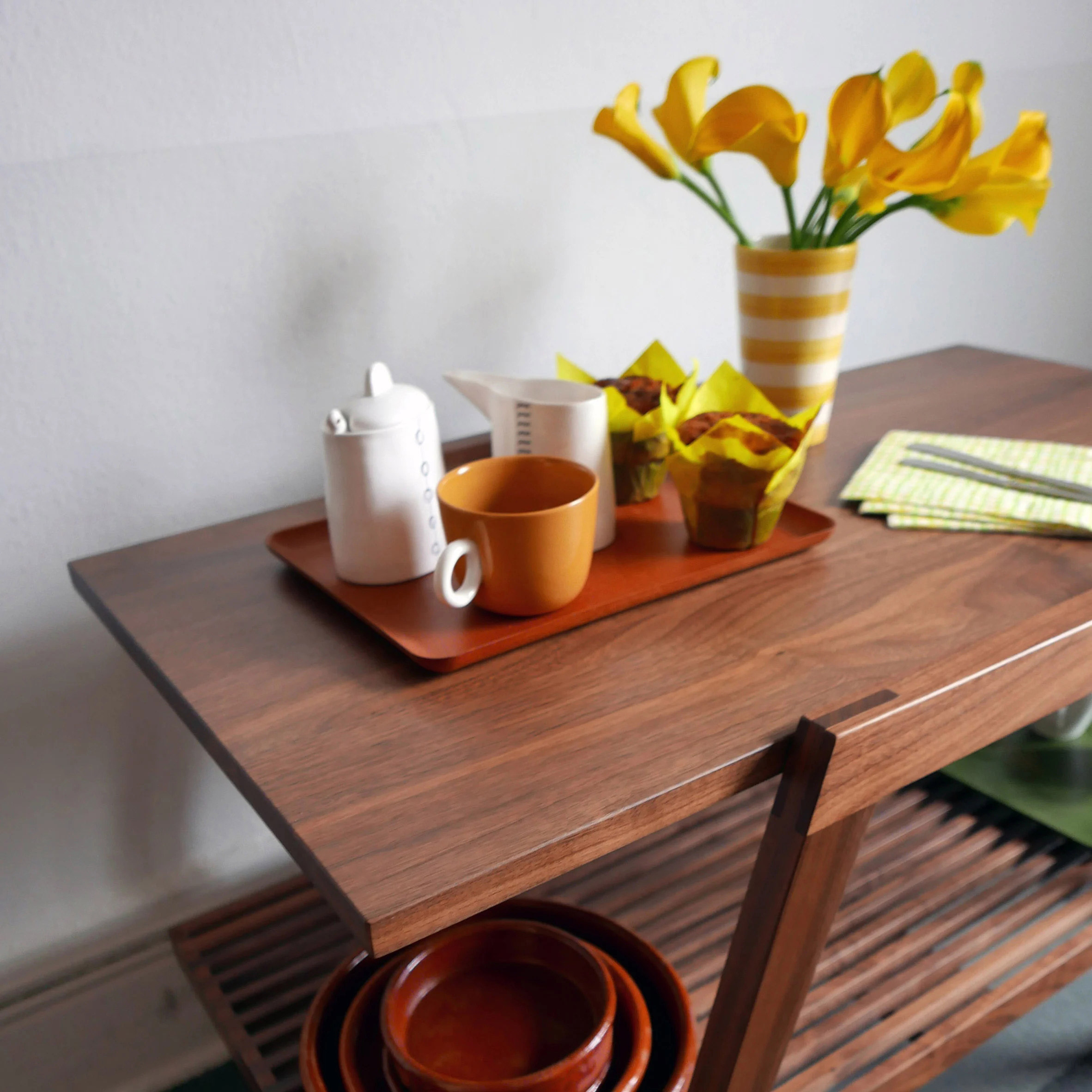 Close up of the wooden Slatted Tea Cart with a tea set