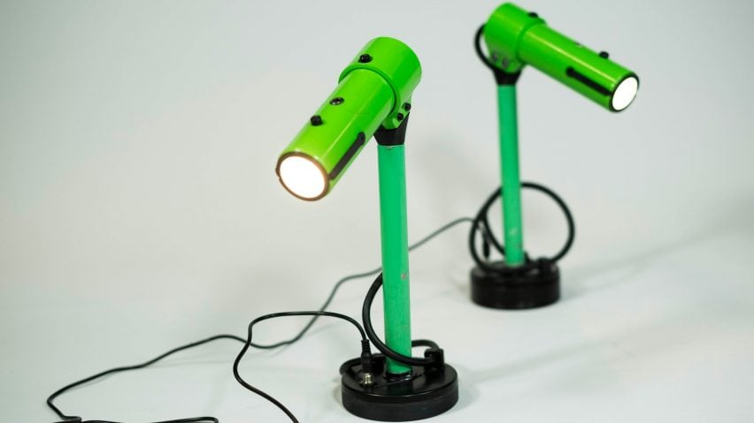 Two lime green desk lights made from scooter parts