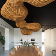 Office with rattan ceiling sculpture