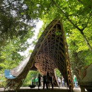 Timber shelter at Westonbirt arboretum by Invisible Studio 