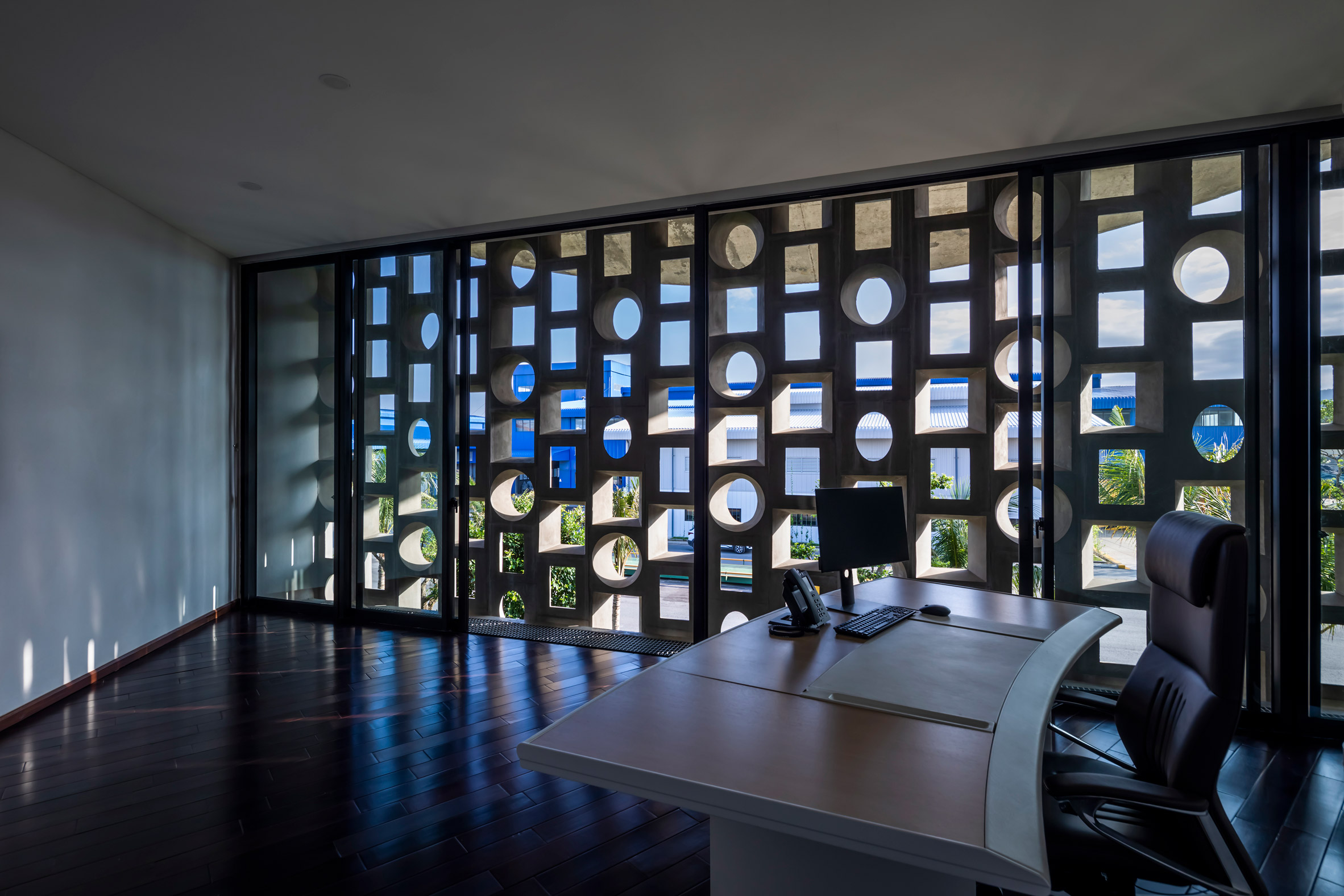 Office with perforated-blockwork wall