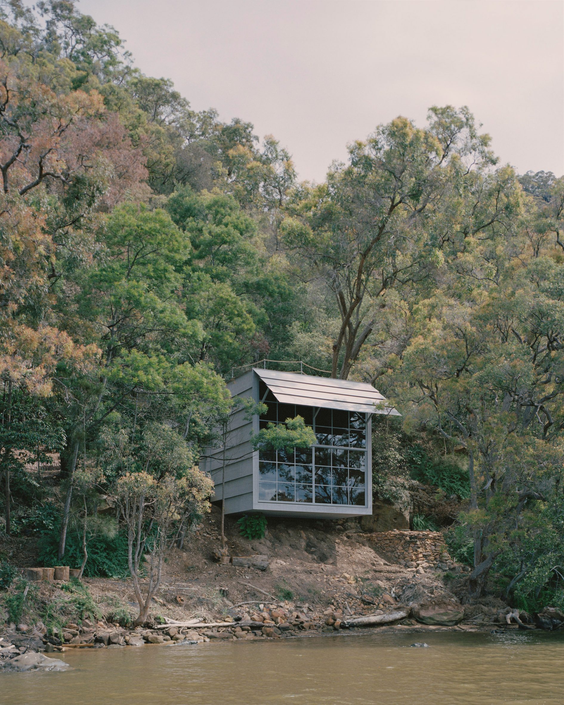 Marramarra Shack is pictured facing a creek