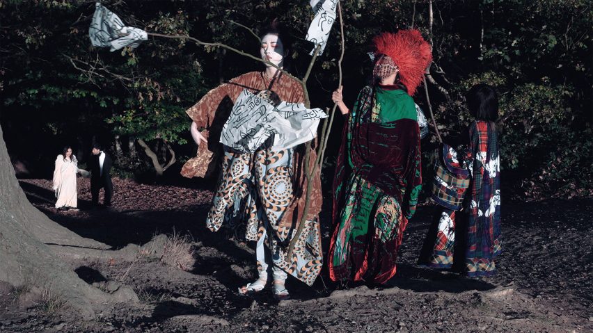Fashion performers in the woods