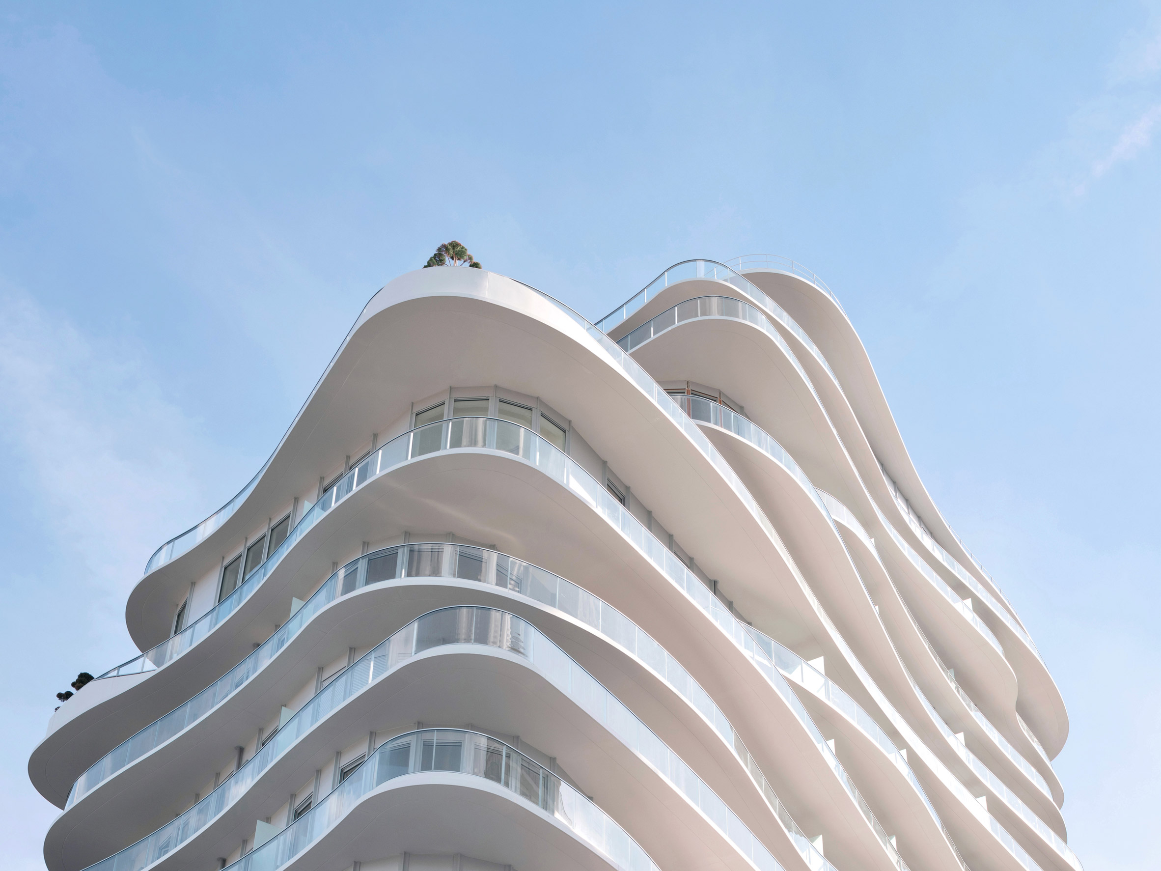 Curved white balconies at Clichy-Batignolles