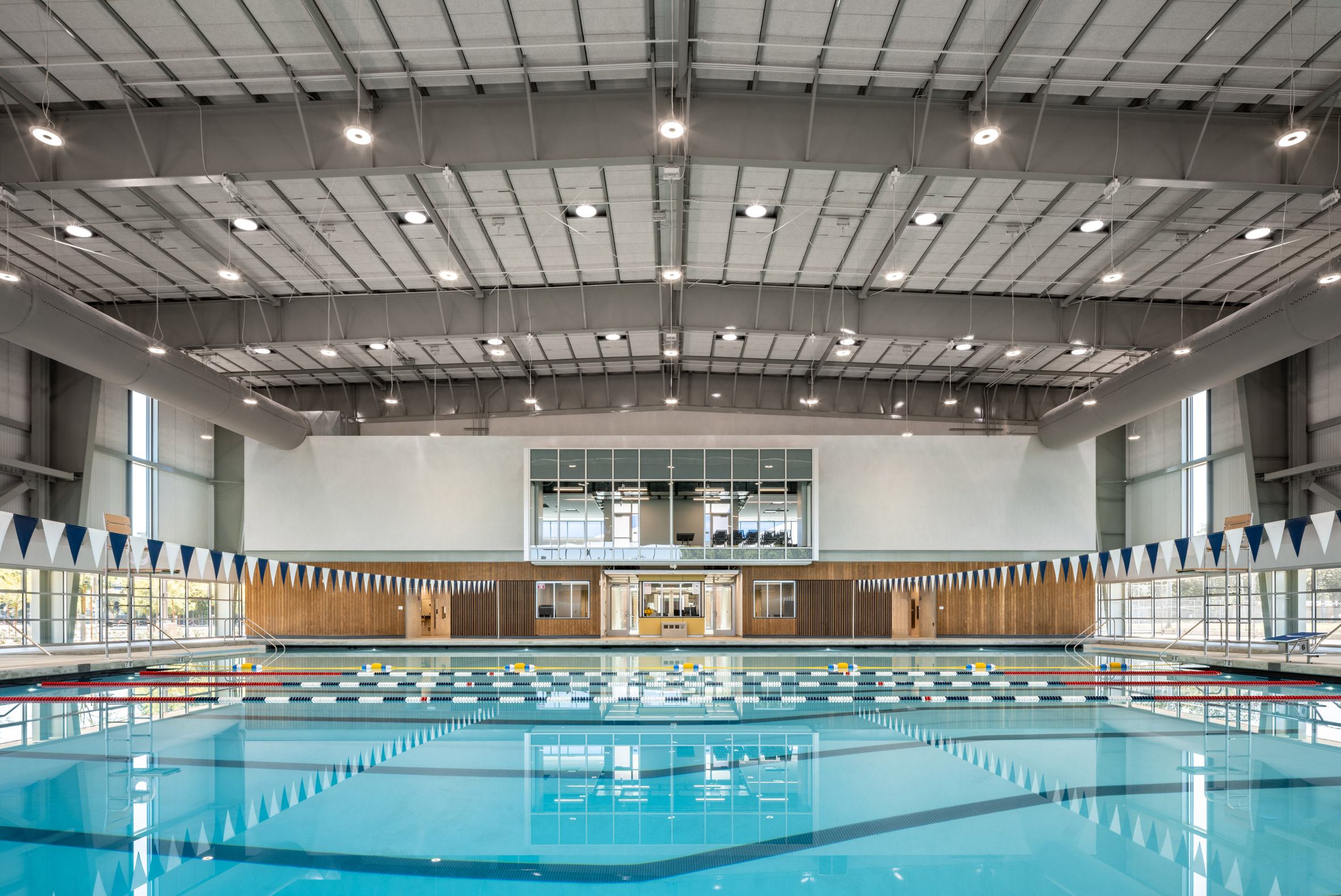 Swimming pool in the building designed with skylights
