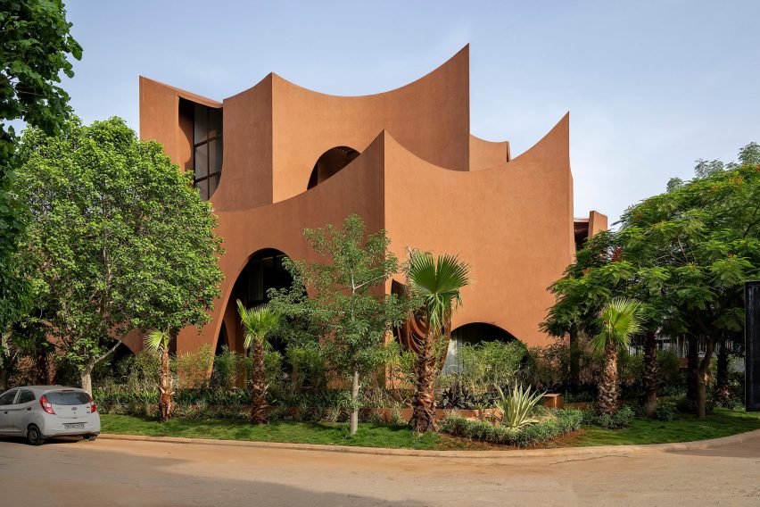 Exterior image of Mirai House of Arches behind trees