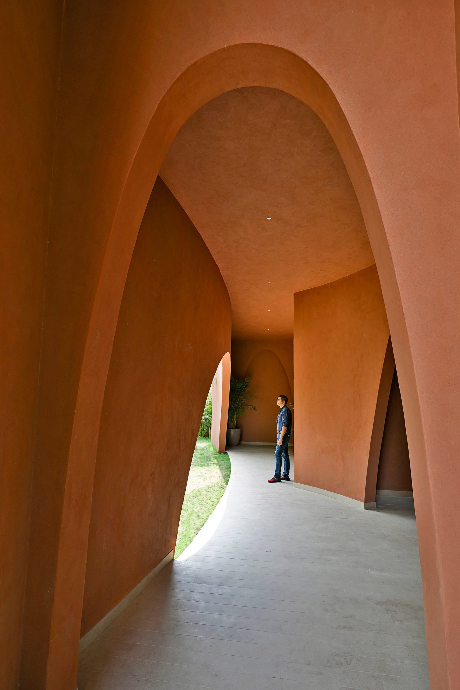 Image with arches leading to a garden