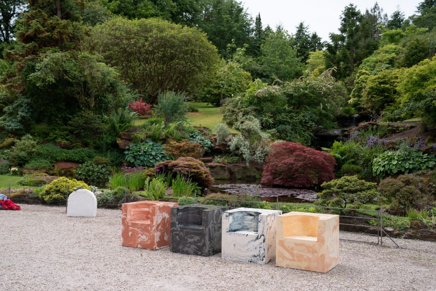 Colourful marble-textured chairs by Rekha Maker for Sitting Pretty exhibition in a garden on Isle of Bute