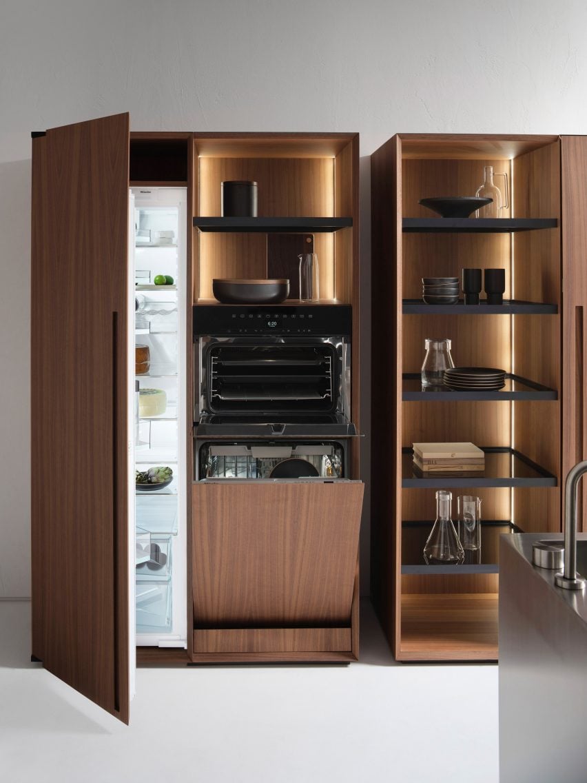 Small Living Kitchens storage units by Falper in wood veneer and showing fridge and shelved interior functions