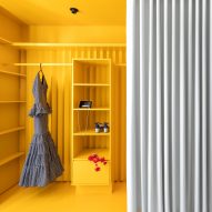 Studio Noju creates intimate colourful spaces within open-plan Seville apartment