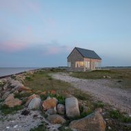 GinnerupArkitekter designs stone-clad summer house on Danish island