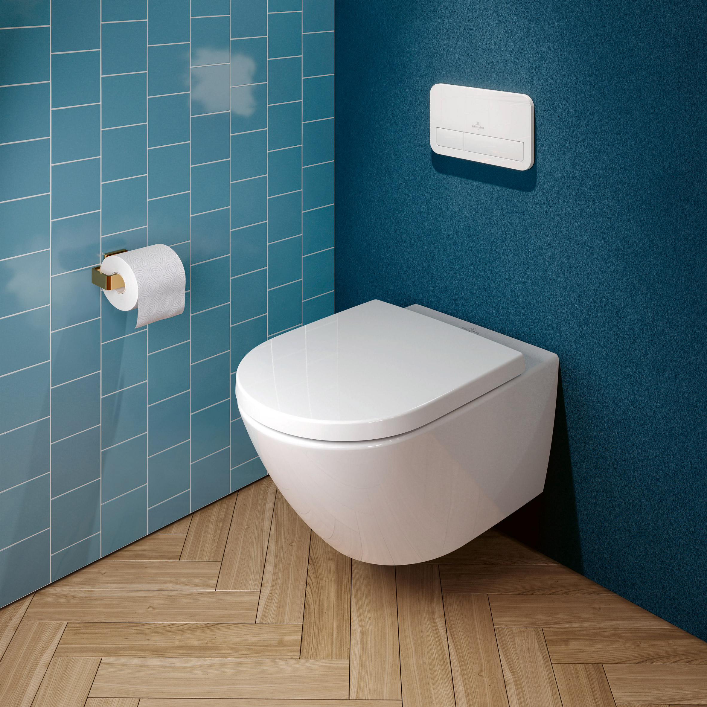 Wall-mounted toilet in a bathroom with blue tiled walls and wooden flooring 
