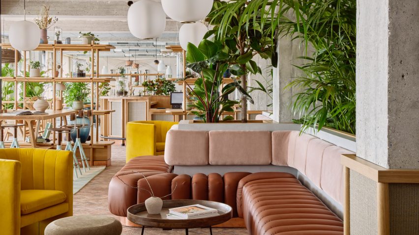 Leather upholstered seat area in co-working space inside Wunderlocke hotel in Munich, designed by Holloway Li