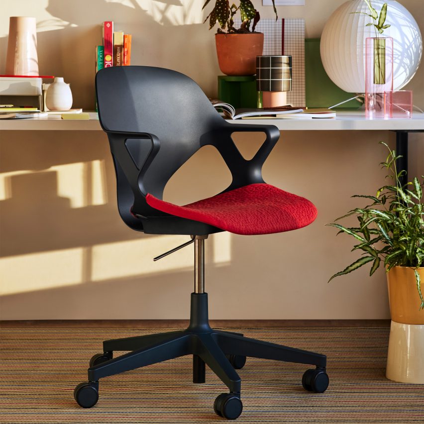 Black Zeph Chair with red seat cushion at a desk