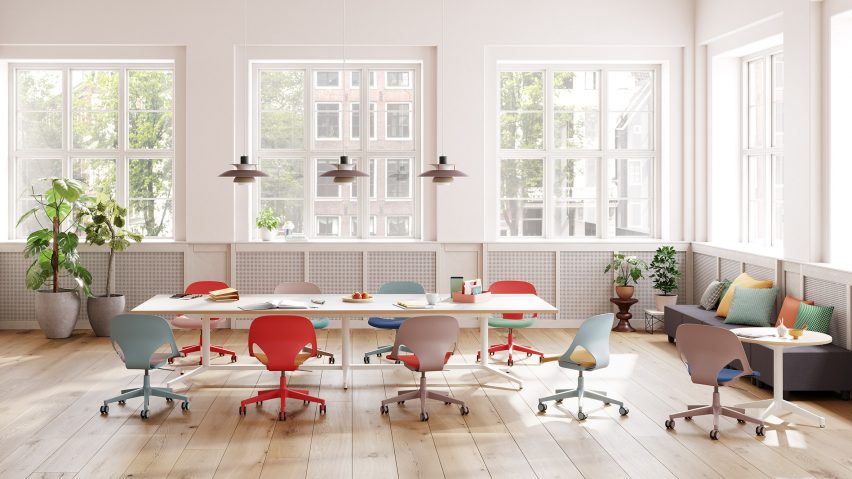 Zeph Chairs in a range of colours around a table in an open-plan office