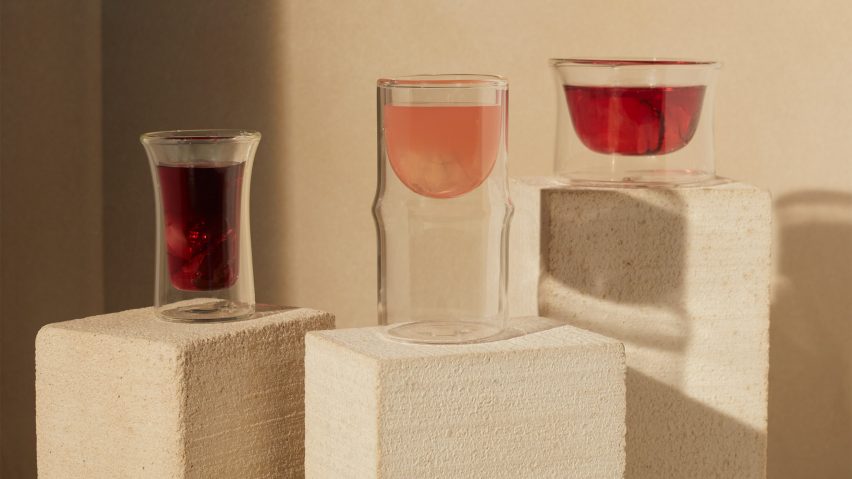 Three glasses with varying shades of red