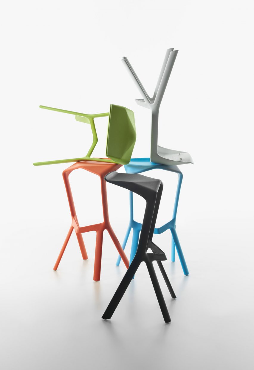 Colourful polypropylene stools on top of each other