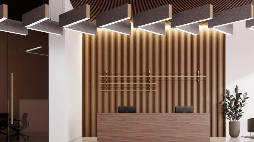 Photograph showing reception area with repeating chevron patterned acoustic lighting ceiling fixture
