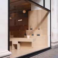 Image of the Jacquemus Selfridges store through a window