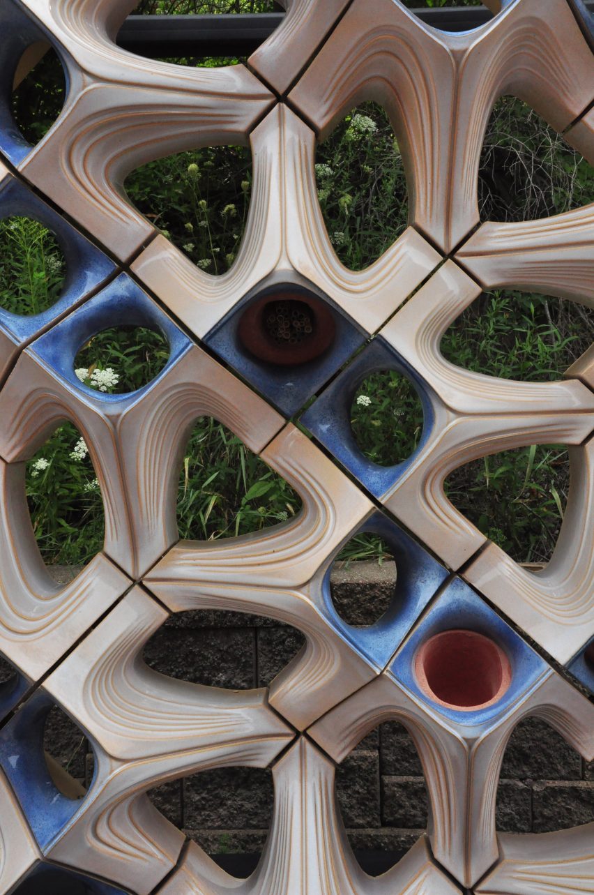 Image of the facade system set in front of a green wall at Architectural Ceramic Assemblies Workshop