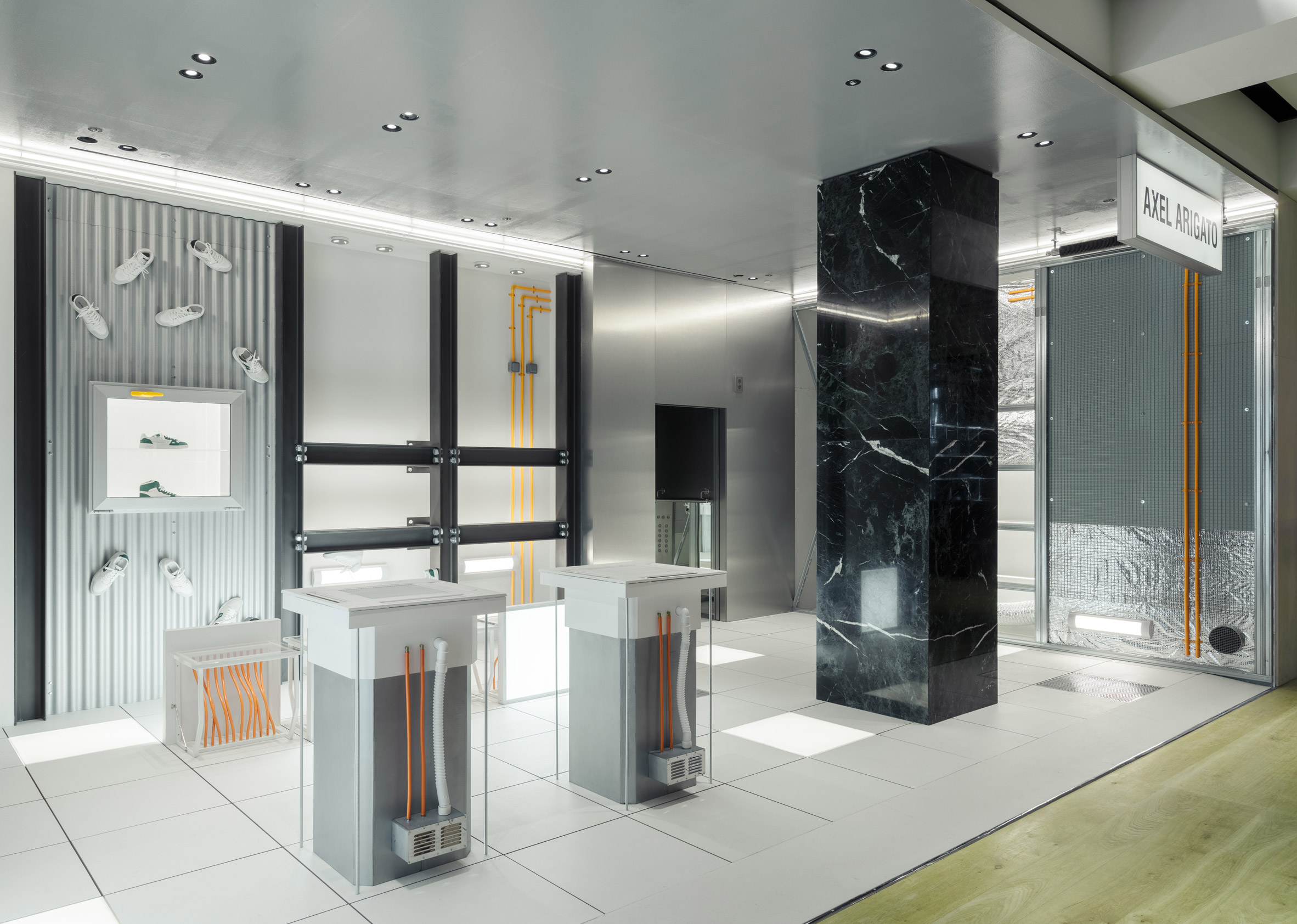 Interior image of the office-themed Axel Arigato shop at Selfridges