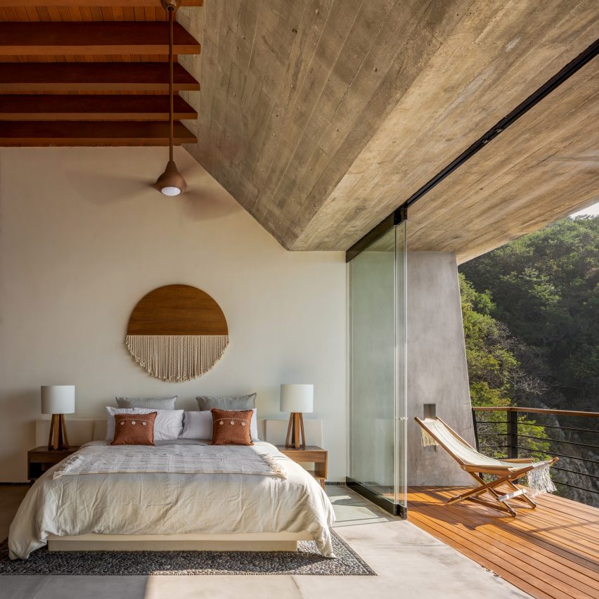 Bedroom with sloped concrete roof