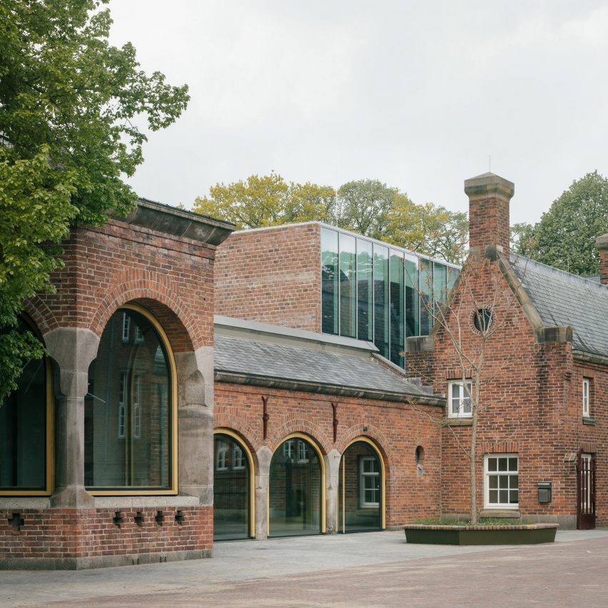 A 1930s brick building with new arched windows