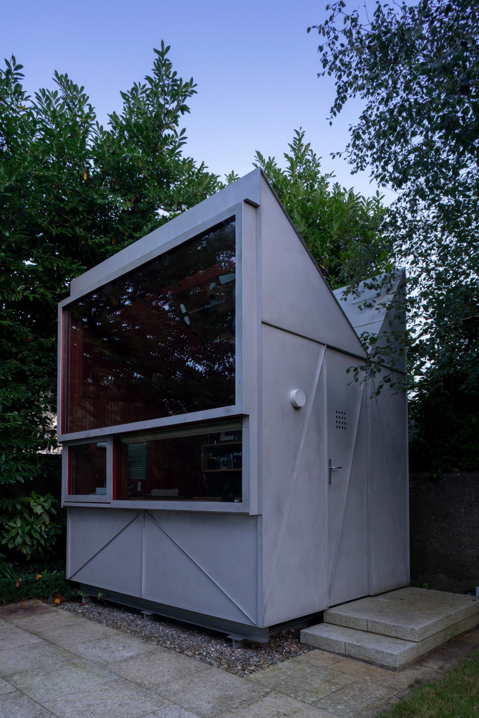 Triangular aluminium writer's hut by Clancy Moore Architects