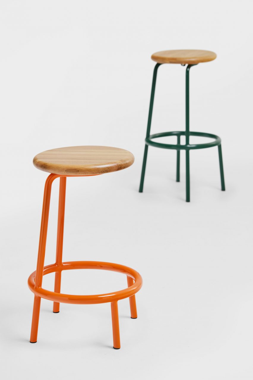 Two Volar stools by Derlot with orange and green frames