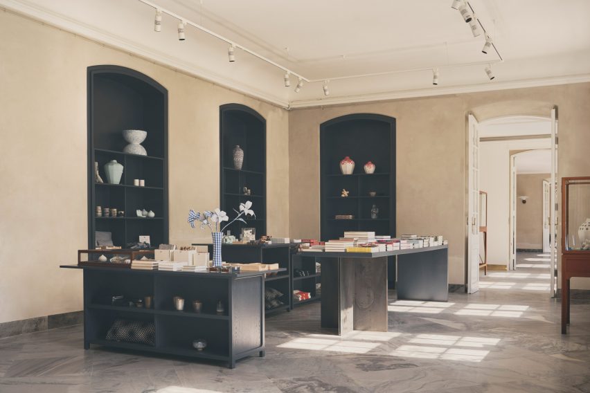 Museum shop with stone floors and built-in cabinets
