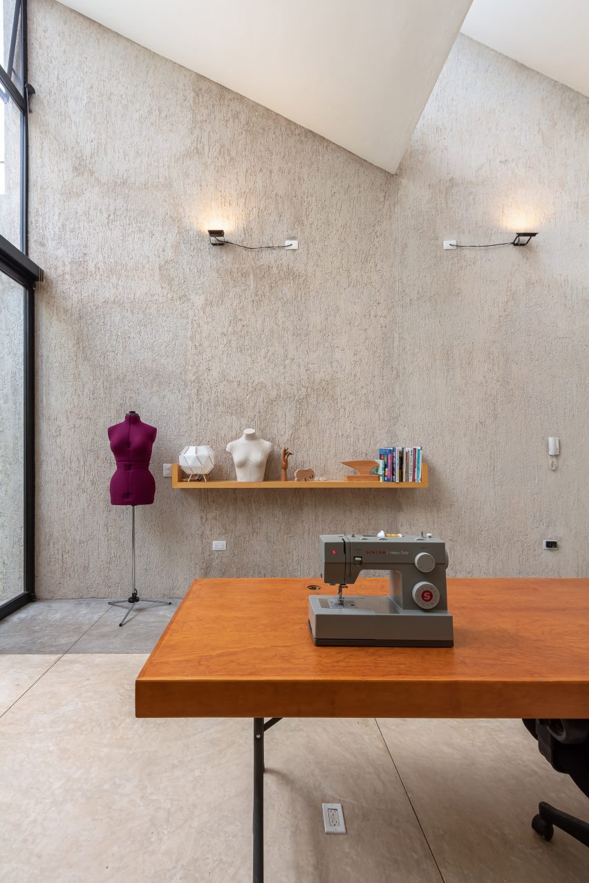 Concrete walls and sloped ceilings in artist studio