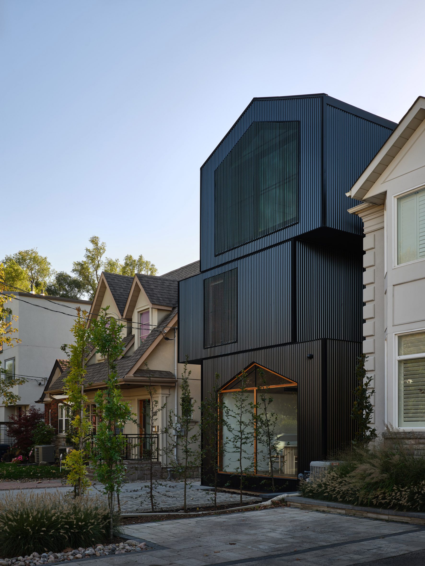 Black corrugated aluminium house in Toronto by StudioAC