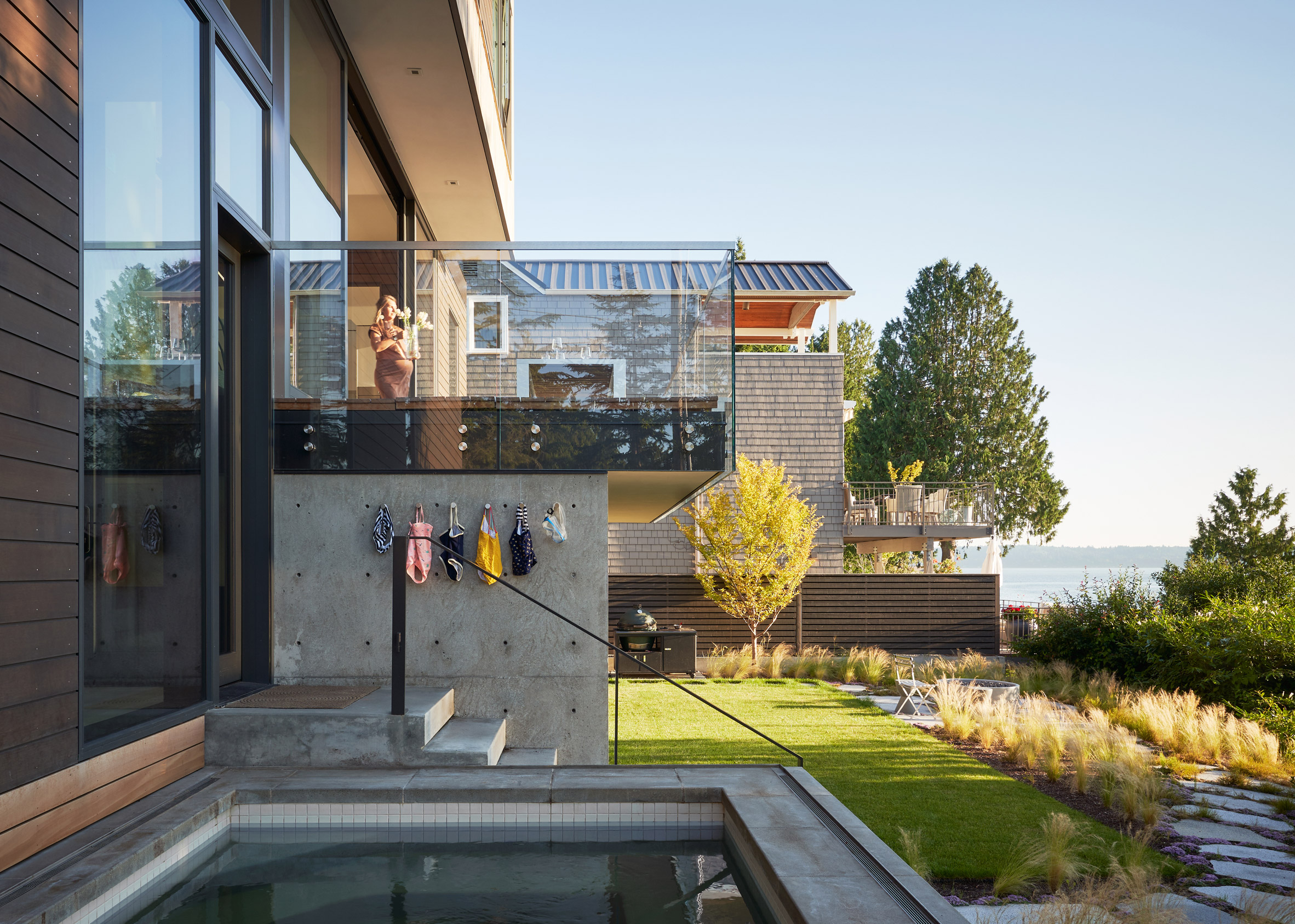 Three-storey waterside home in Seattle with balcony and pool