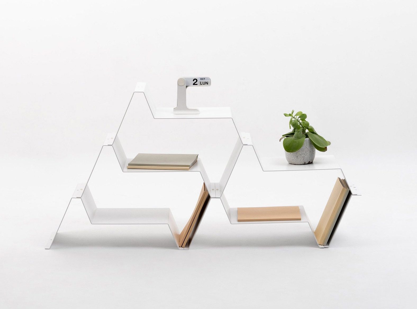 Three Frequence modular shelf elements arranged as a display
