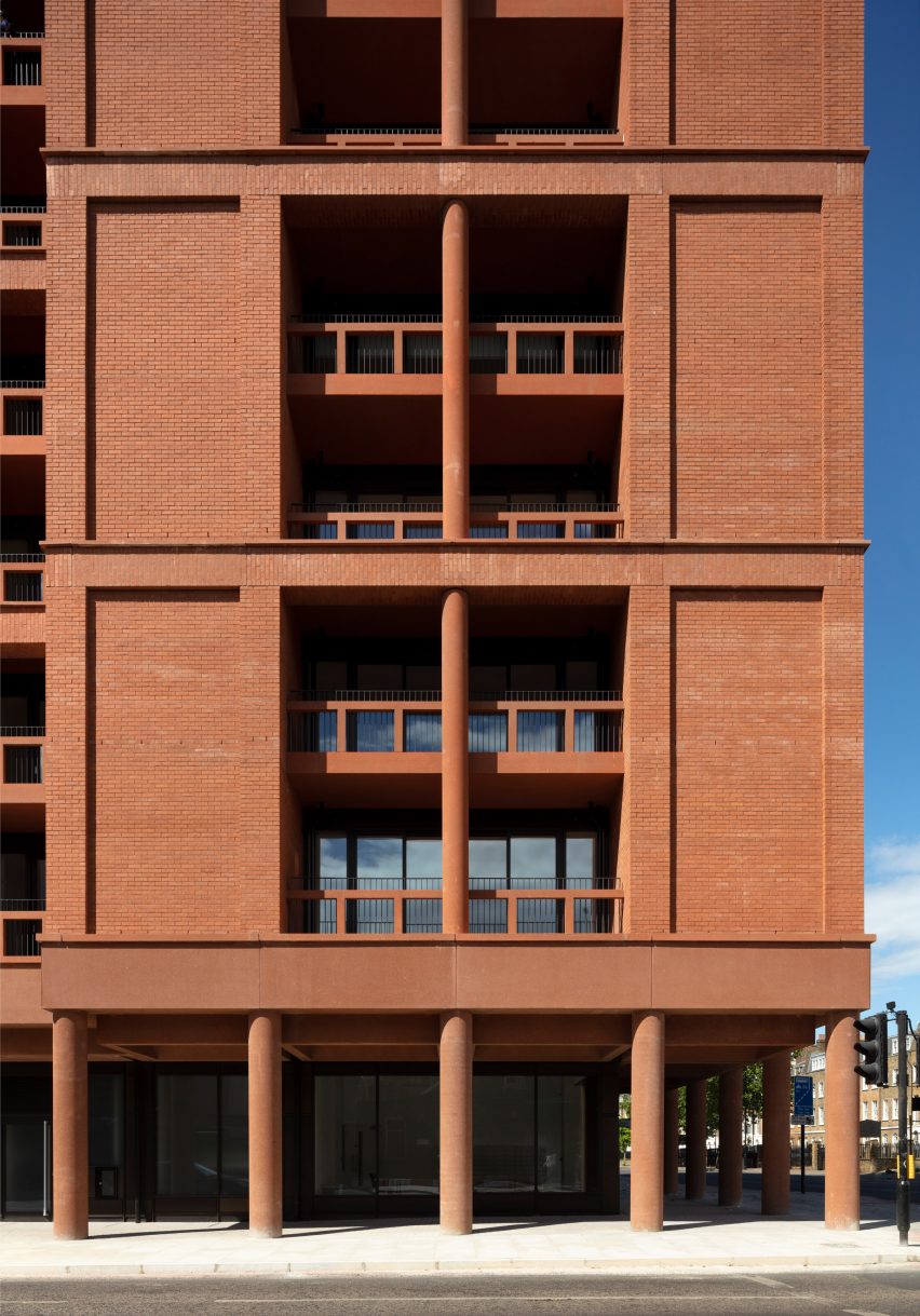 Red-brick and pigmented-concrete facade
