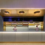 Shenzhen's Haidilao restaurant by Vermilion Zhou Design Group features blue-green interiors