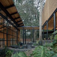 Herchell Arquitectos completes courtyard house with "boutique hotel concept" in Mexican forest