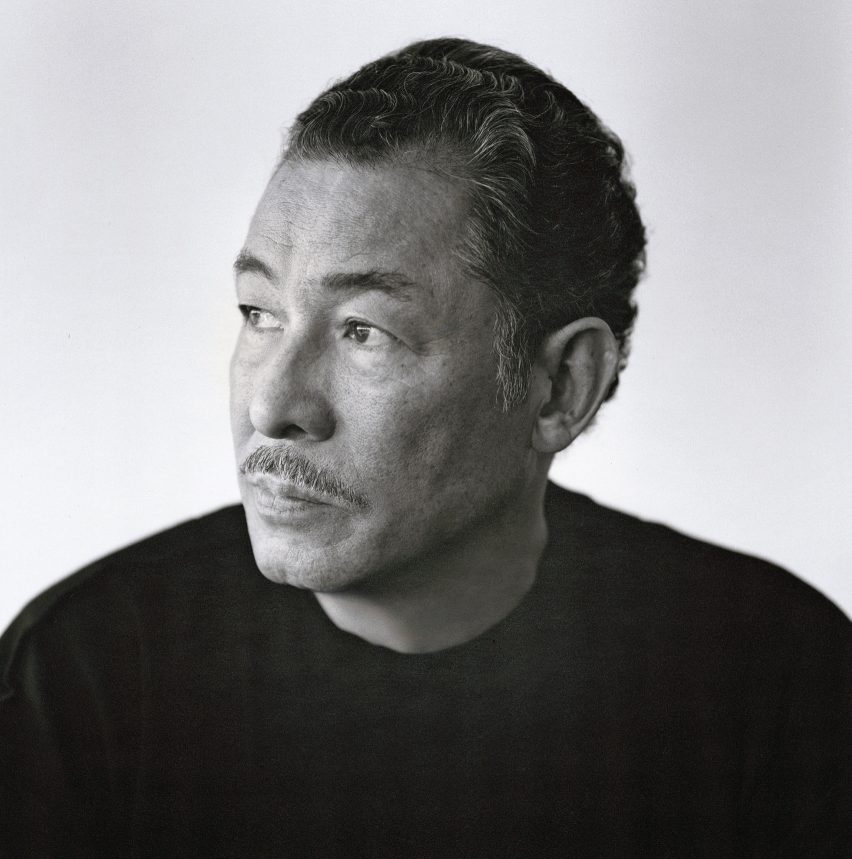 Black and white portrait image of Issey Miyake