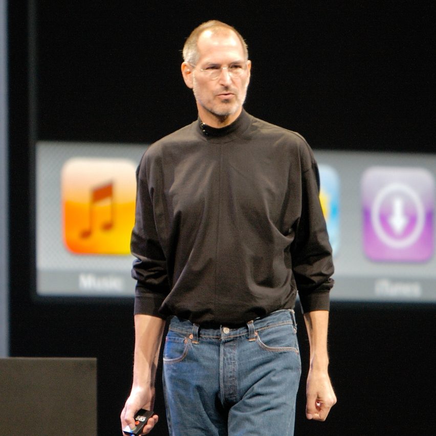 Steve Jobs at an Apple presentation wearing a black Issey Miyake turtleneck