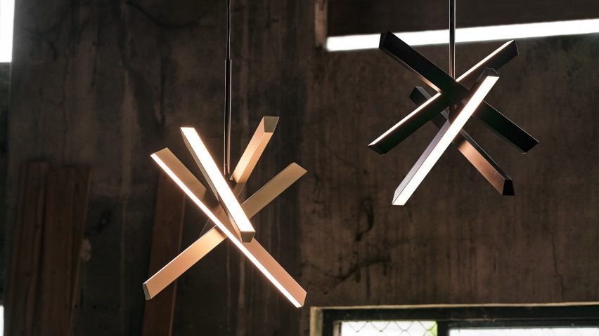 Gold and black Konnect pendant lamps by Seeddesign
